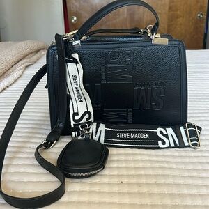 Steve Madden only used twice. Great condition. Comes with coin purse.